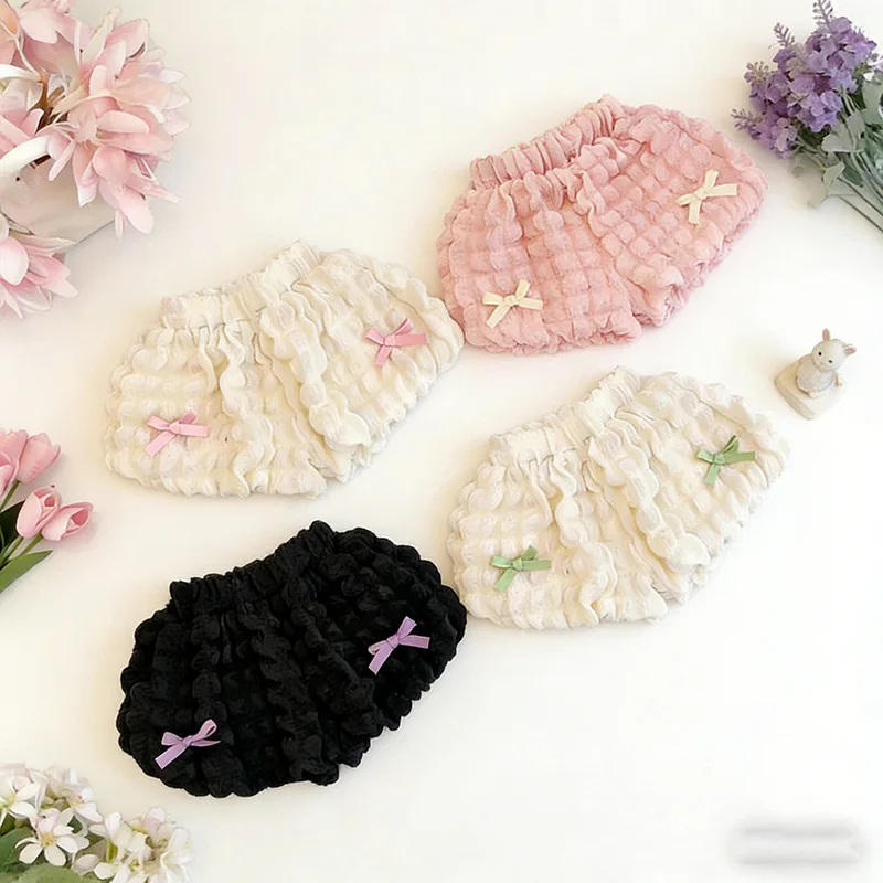 LovelyBloom – Mjukt & gulligt – Barnbyxor med volanger och rosett