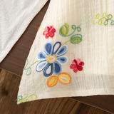 MiniFlora – Lätt och charmig – Broderad klänning för småflickor