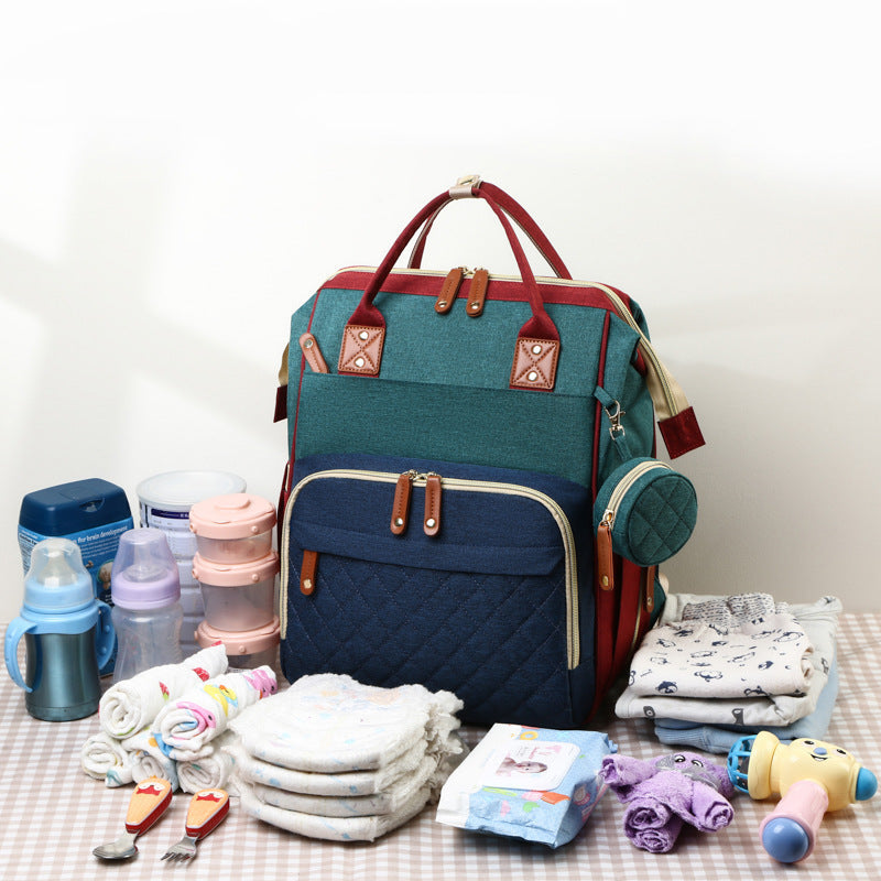TravelNest – Alltid en viloplats – 2-i-1 skötväska med babysäng