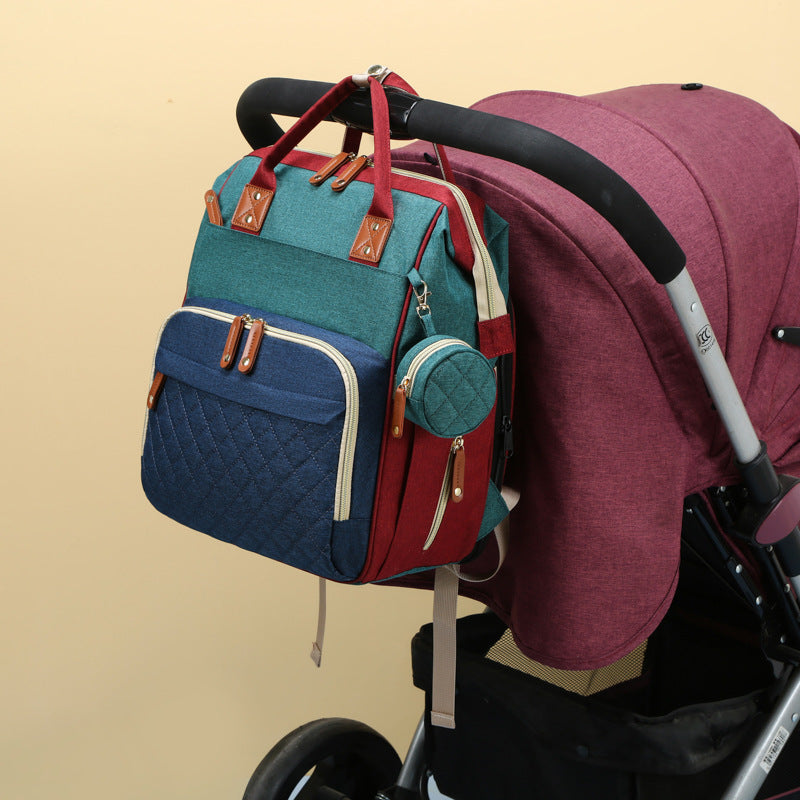 TravelNest – Alltid en viloplats – 2-i-1 skötväska med babysäng